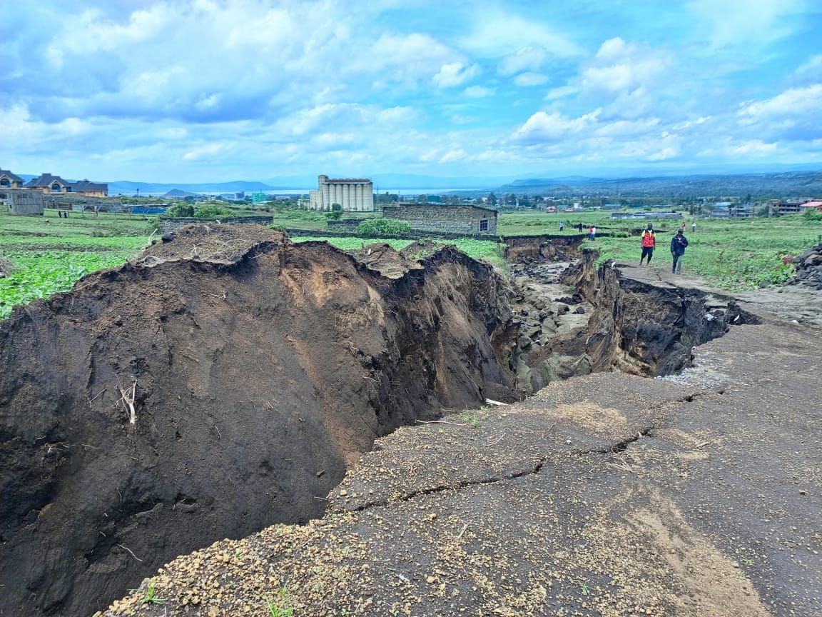 Special Report: Heavy downpour leaves a trail of death, fissures, in its wake