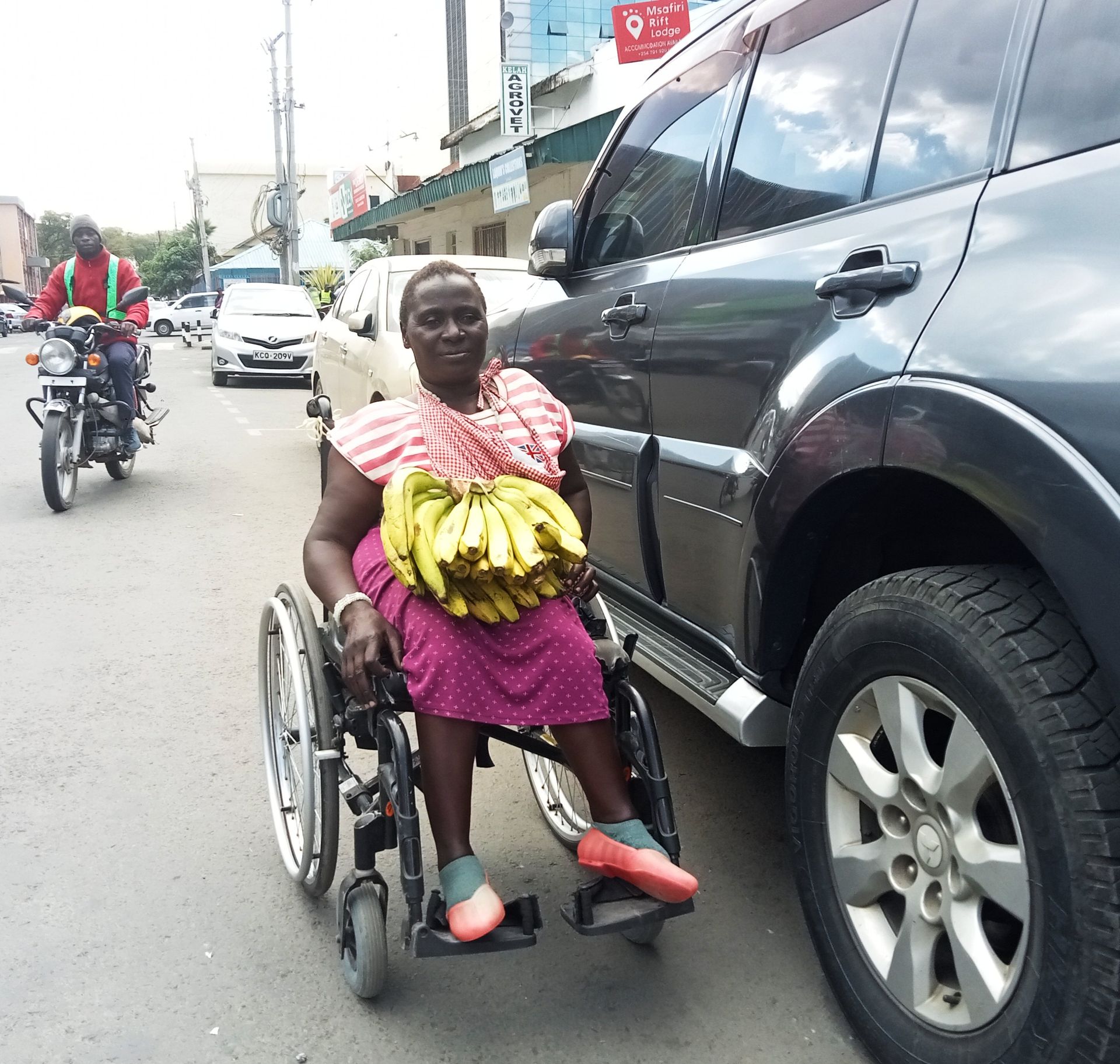 The inspiring story of Eunice Atieno who hawks fruits in Nakuru city from her wheelchair