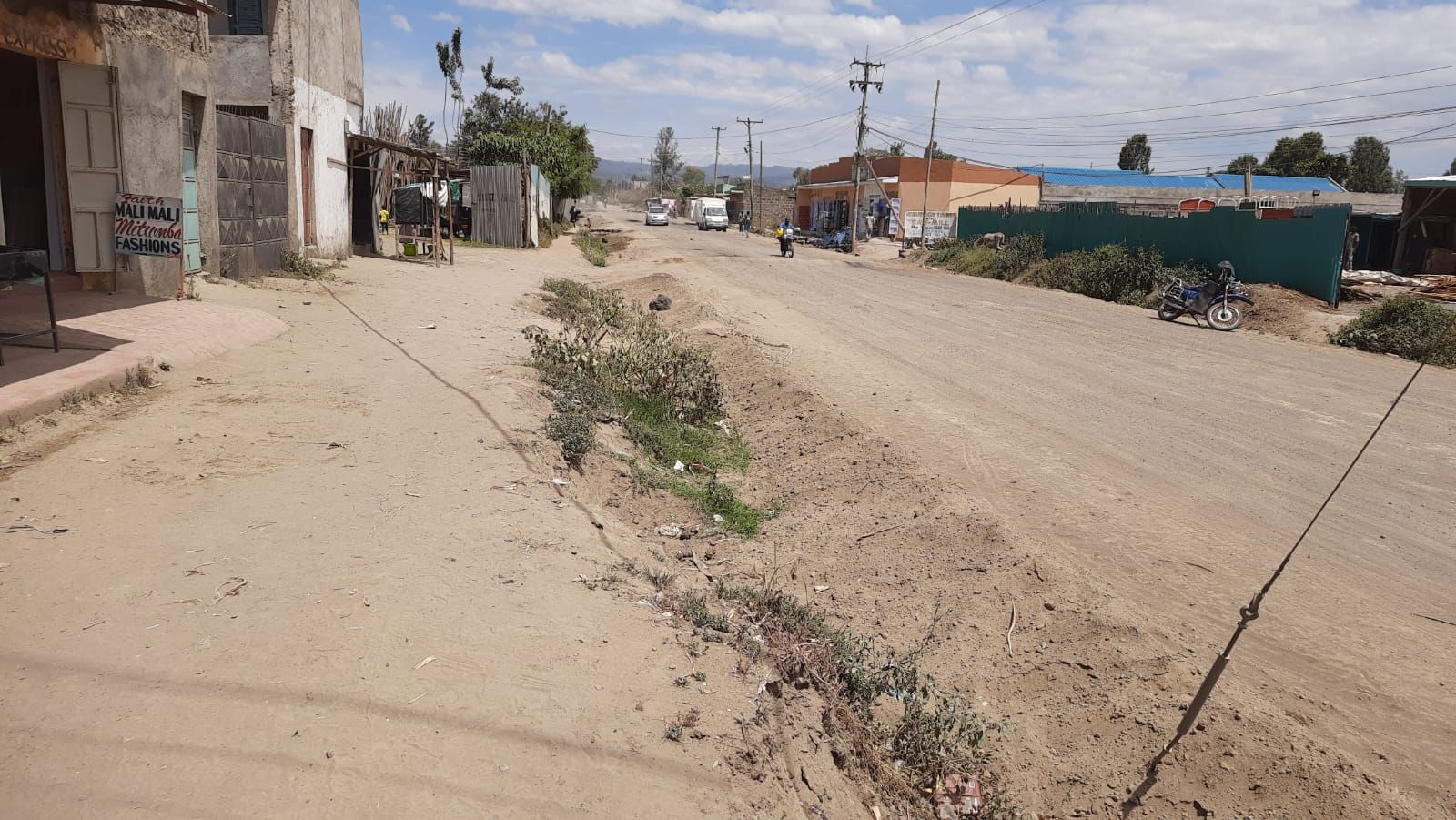 Contractor resorts to 'watering' road in Bahati, as completion stalls