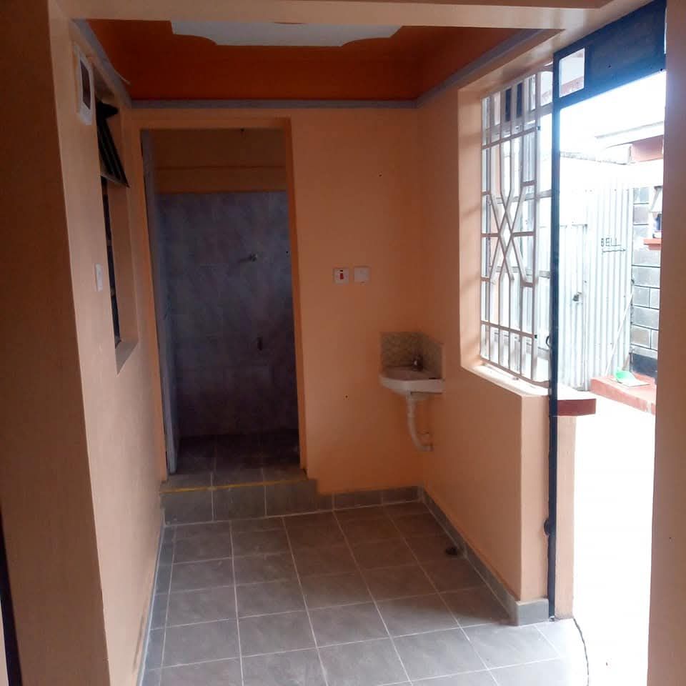 House hunting in Mawanga: Where the washroom says hi first!